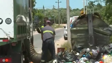 Municipio F con contenedores desbordados.