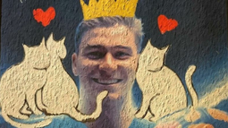 El mural de Julián Álvarez rodeado de gatos.